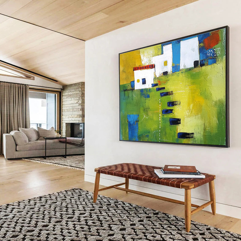 Large abstract painting showcasing green fields, white buildings with blue lines, and black stairs, featuring thick brush strokes and vibrant geometric shapes.SC193