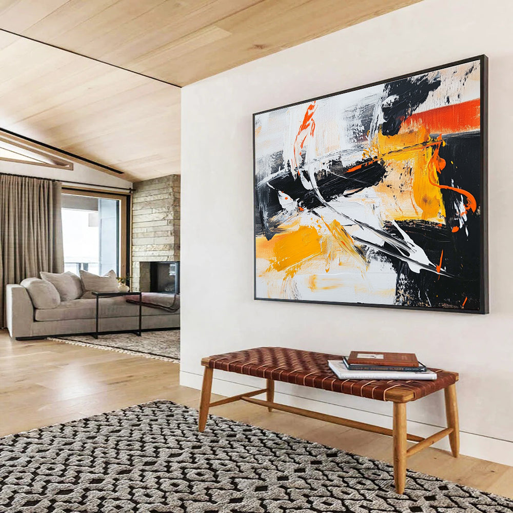Large abstract painting in black white and orange featuring vibrant yellow brush strokes for a dynamic artistic touch.SC142