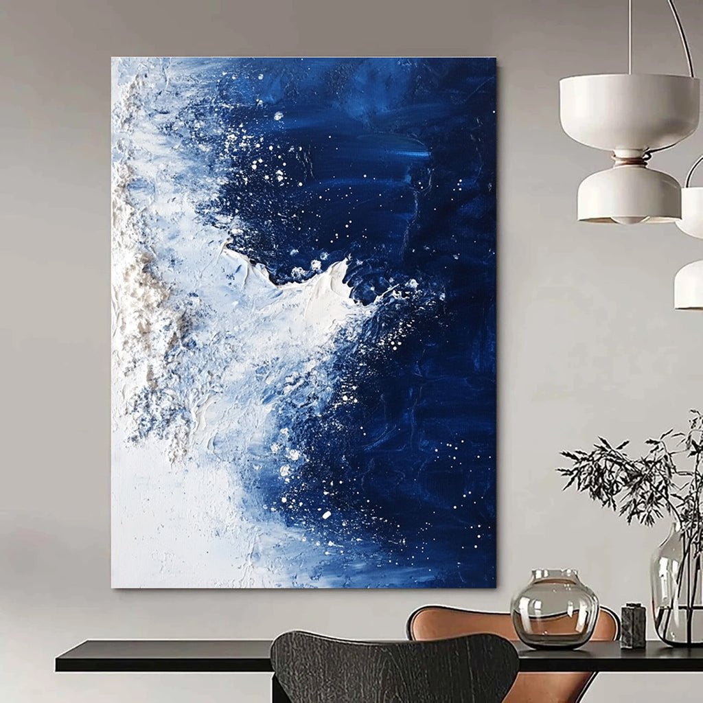 Large abstract painting depicting the North Pole with deep blue water ice and dynamic white brush strokes.STSC341