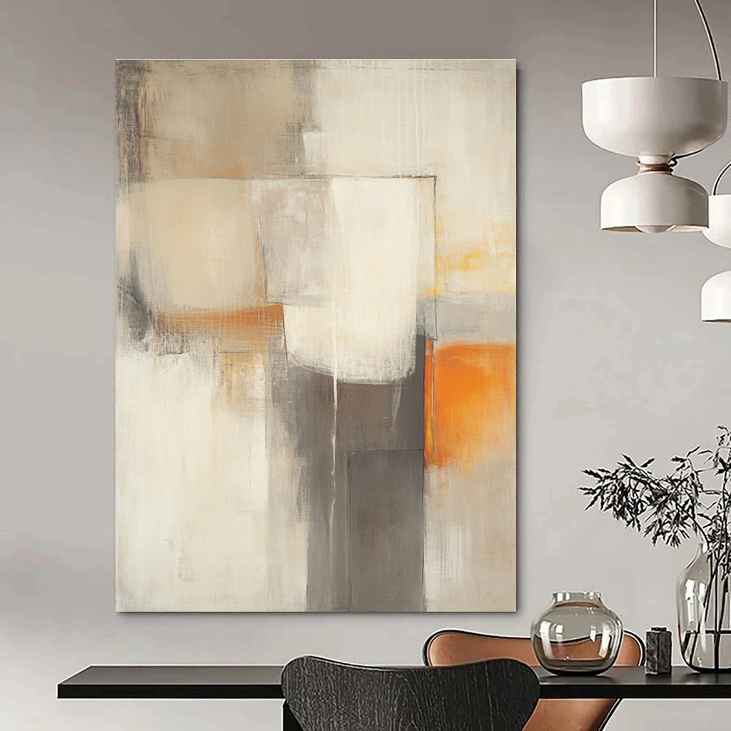 Large abstract painting in beige and grey tones featuring blurred geometric shapes and a subtle orange accent for vibrancy.STSC753