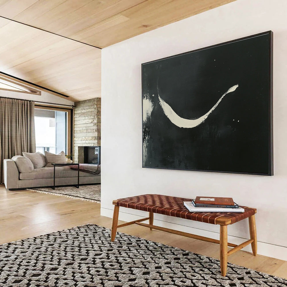 Large abstract painting featuring curved white brush strokes on a black background showcasing elegance and negative space in a minimalistic style.SC186