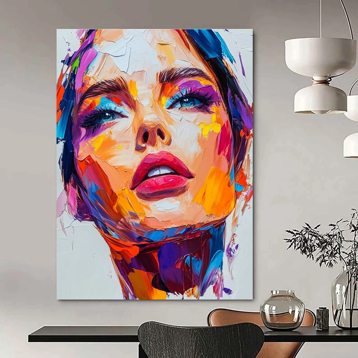 An abstract painting featuring a close-up portrait of an attractive woman with vibrant colors and thick brush strokes on a white background.STSC1162
