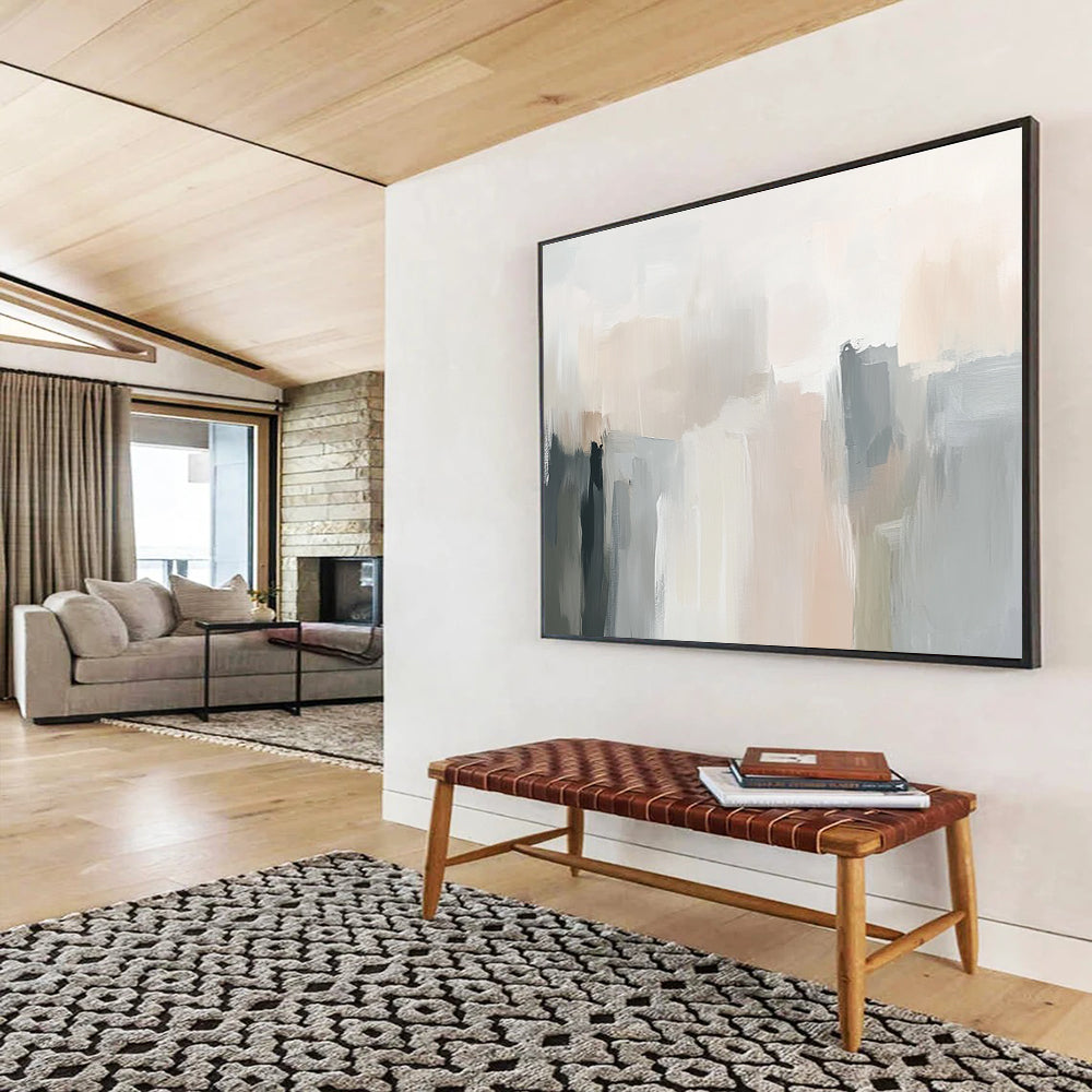 Large abstract painting in soft neutral tones with gentle brushstrokes and subtle color transitions creating an elegant atmosphere.SC058