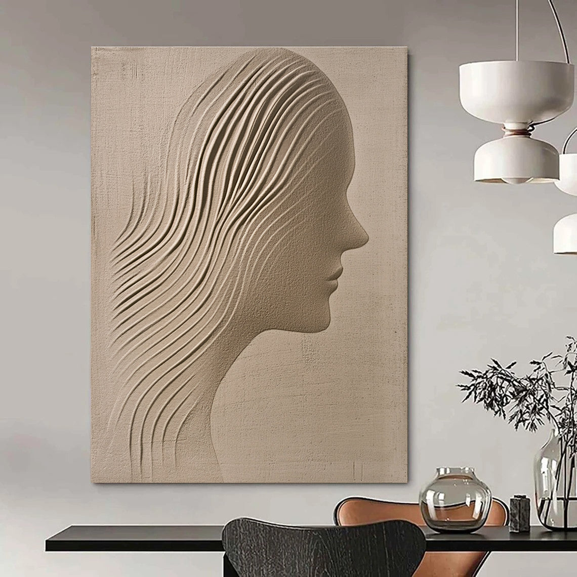 A large abstract painting featuring a sand-colored textured wall with an ethereal woman's silhouette gracefully carved into it.STSC1213
