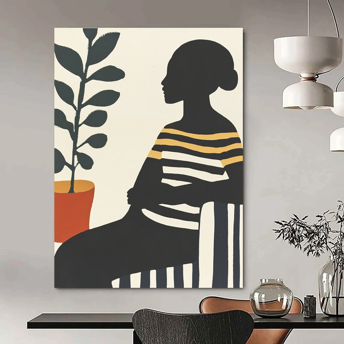 Large abstract painting featuring an African woman on a striped sofa with silhouettes and vibrant colors complemented by a pot of green leaves.STSC537