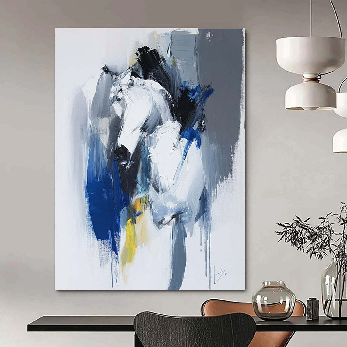 Large abstract painting in blue and white with dynamic brushstrokes reveals movement and emotion featuring elements of strength and energy.STSC036