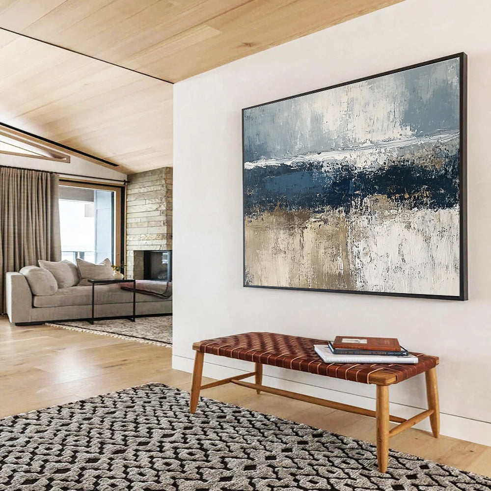 Large abstract painting of the sea featuring gray and dark blue tones with brown accents and thick textured paint.SC203