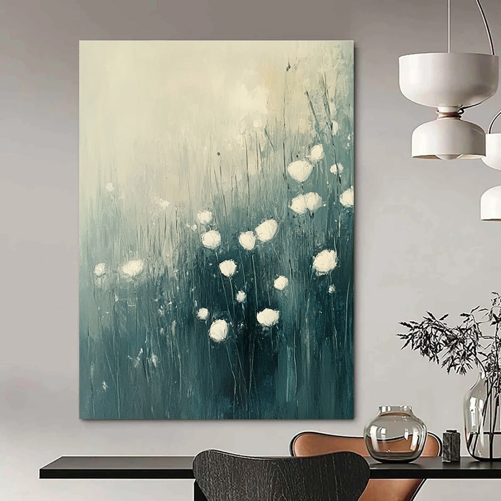 Large abstract oil painting of flowers in grass featuring white and light blue tones with muted colors, perfect for enhancing any space.STSC184