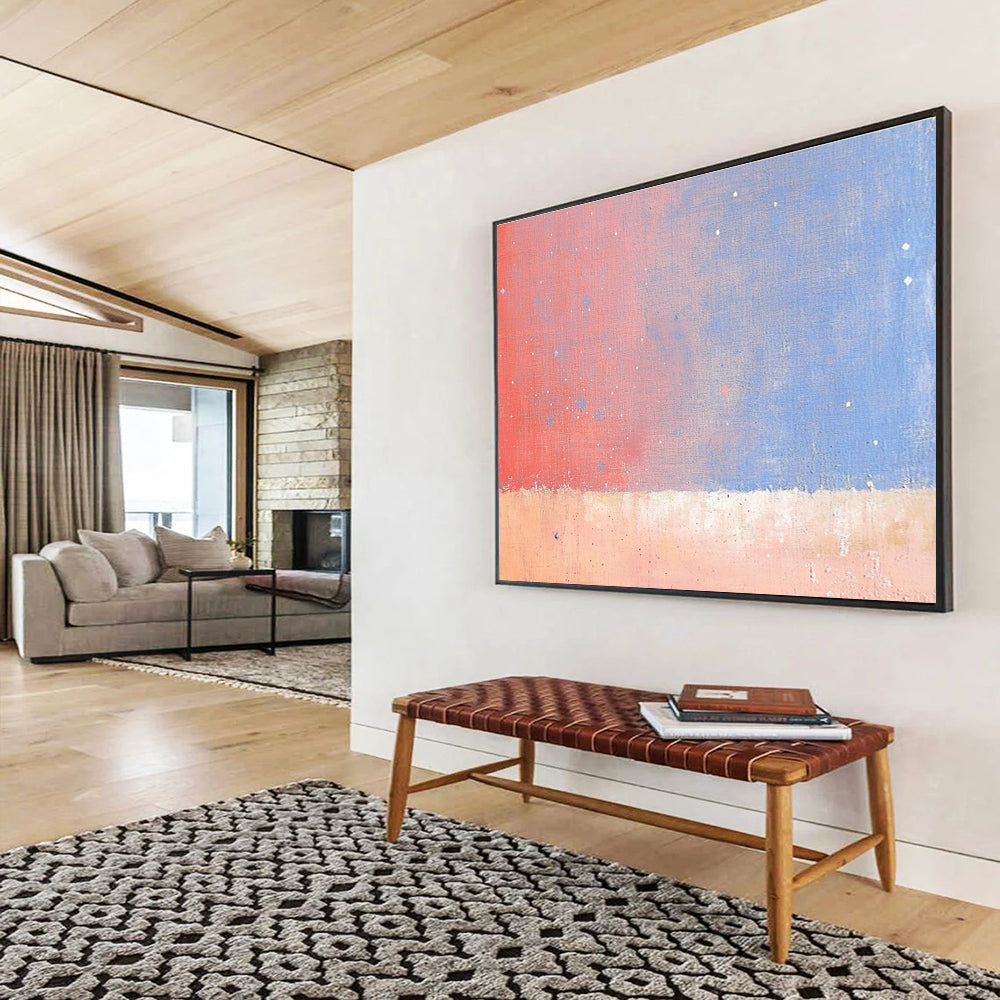 A large abstract painting depicting the sky and stars over an orange desert with soft pink and blue tones in a minimalist style.SC366