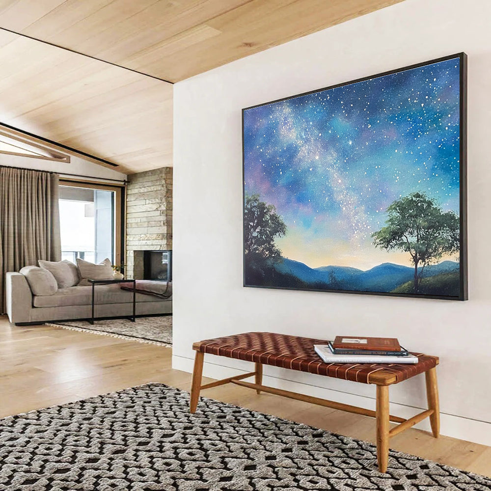 A large abstract painting featuring a serene starry sky with the Milky Way, silhouetted trees on hills, and a fantasy-inspired azure background.SC421