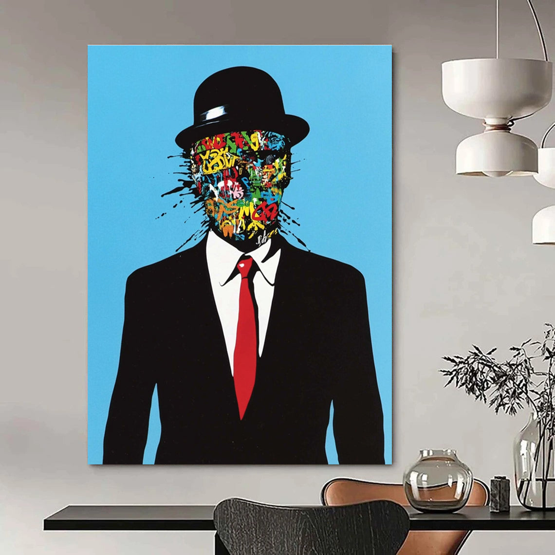 An abstract artwork featuring a man in a black suit and red tie with graffiti on his face against a blue background in a surreal style.STSC1056