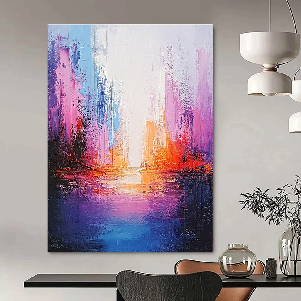 Large abstract painting of an ocean in light purple and pink with a tall illuminated building creating a soothing ethereal atmosphere.STSC264
