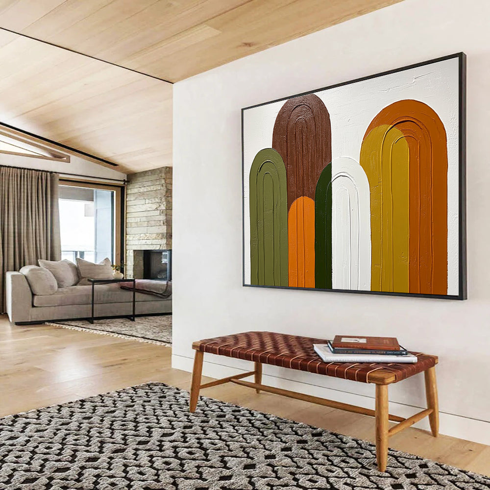 Large abstract painting featuring arches in shades of green brown and orange on a white background with simple colorful shapes.SC590