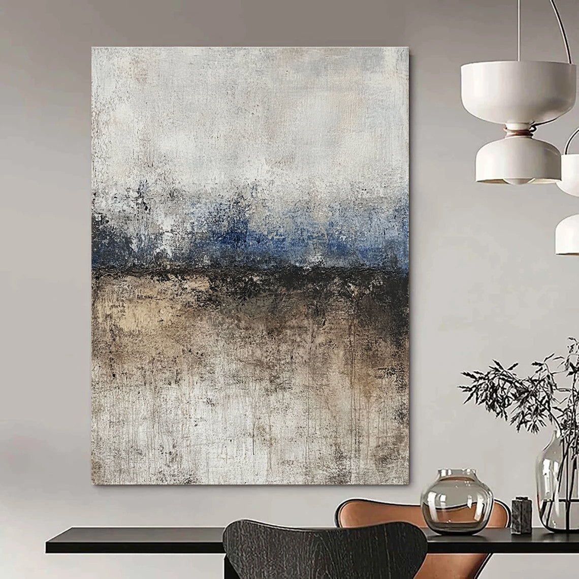 Large abstract painting featuring soft edges and subtle color transitions of beige blue-gray and brown with a path leading to tranquil water.STSC125