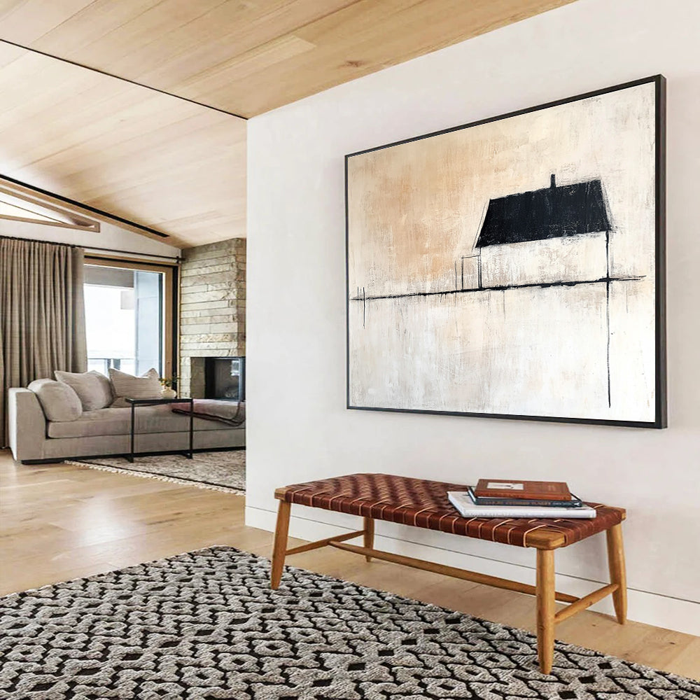 Large abstract painting featuring neutral tones with a single black line beside an old house and expansive white space. Minimalist style enhances tranquility.SC145