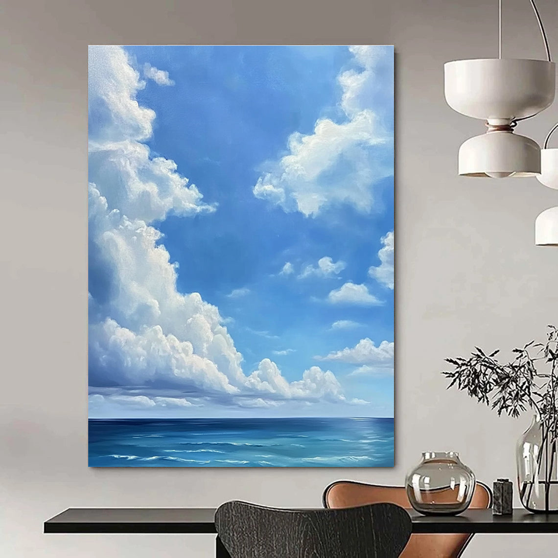 A large abstract painting featuring a blue sky with white clouds and a vast ocean below in a minimalist oil painting style.STSC923