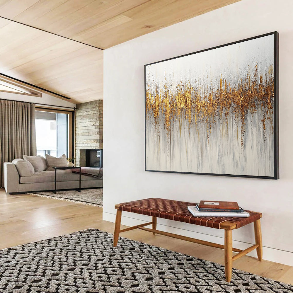Large abstract painting featuring gold and silver glitter texture on a minimalist white background with neutral tones.SC209