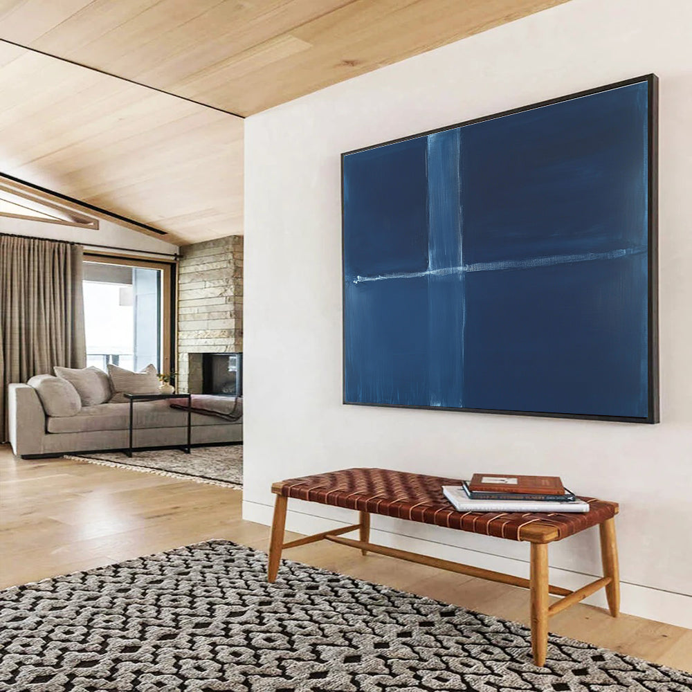 A large abstract painting featuring a deep blue background with a thin straight line and a thick wavy line in the center.SC515