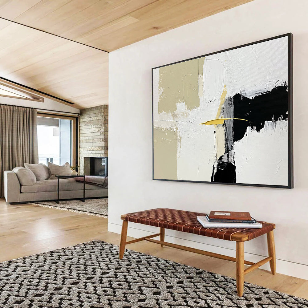 Large abstract painting featuring white beige and black shapes with brush strokes and a small yellow line on an off-white background.SC206