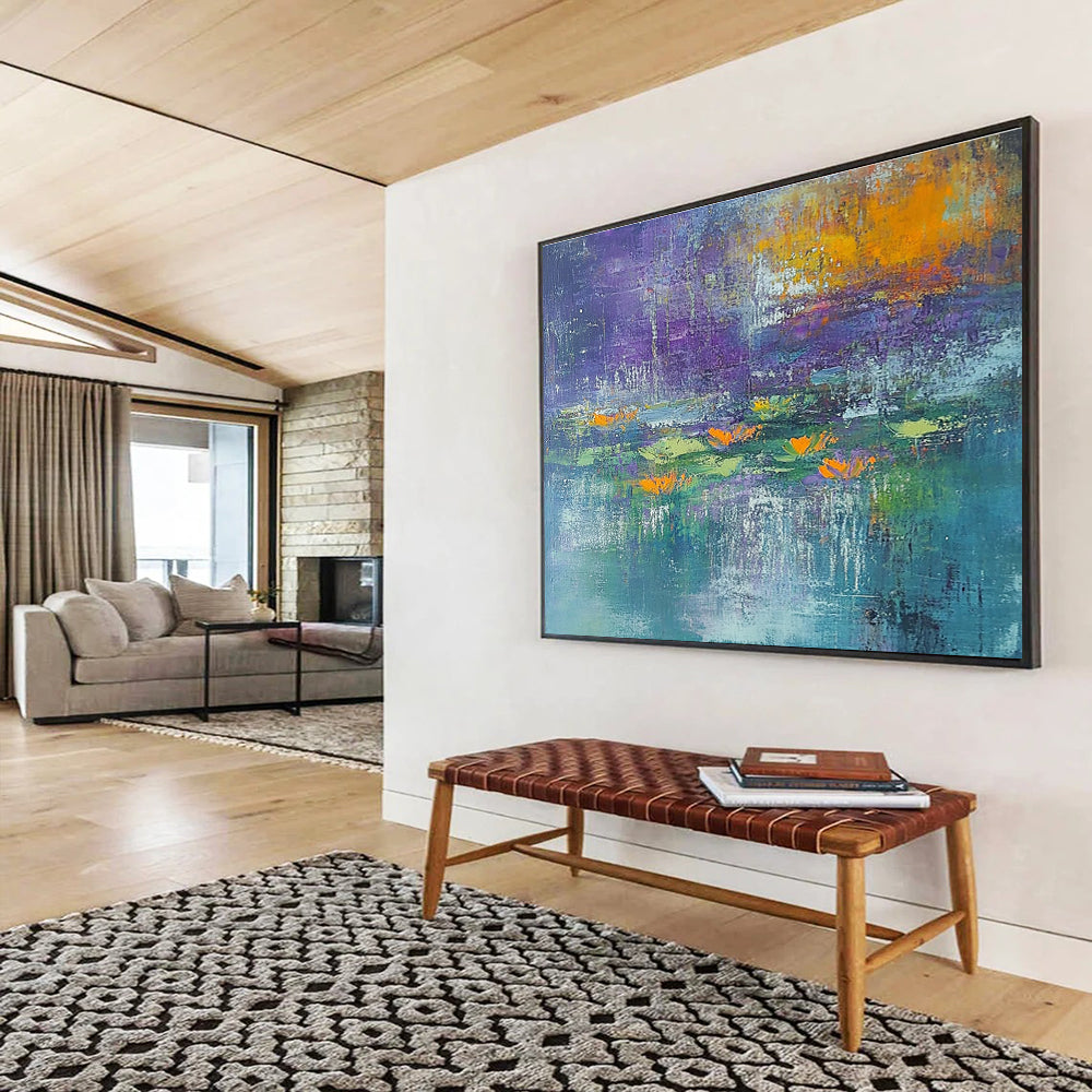 A large abstract painting featuring textured strokes in teal and purple with hints of orange and yellow, depicting serene water lilies at dawn.SC433