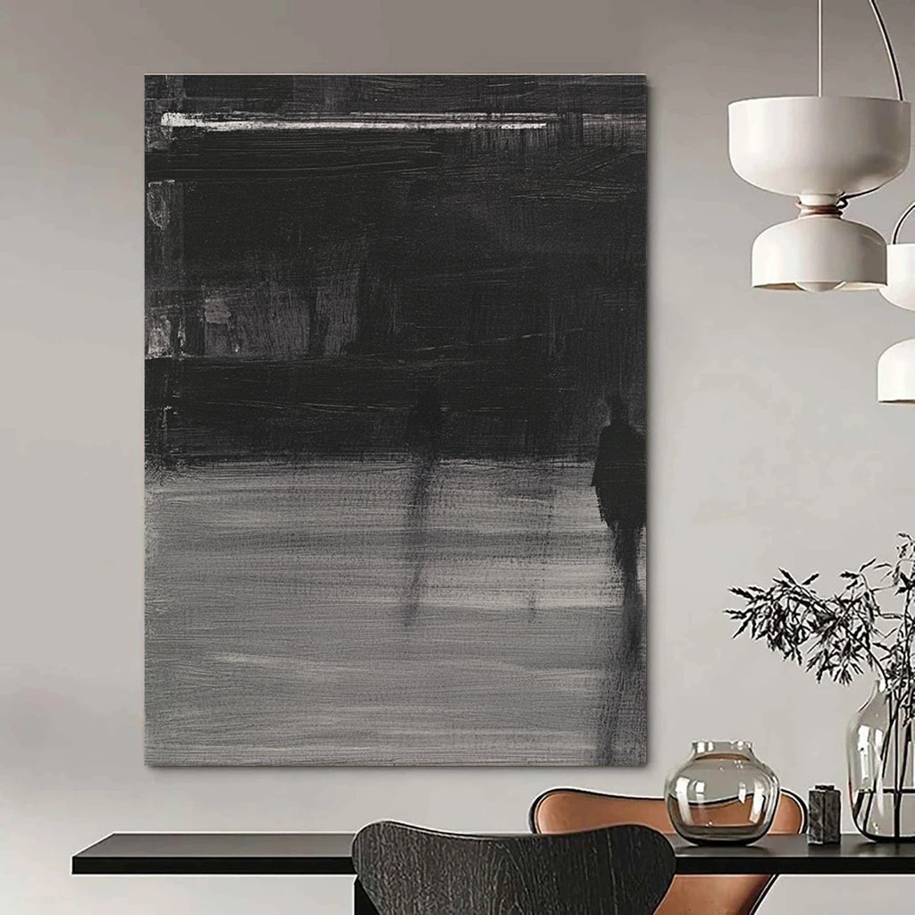 Large abstract painting featuring deep gray tones bold brushstrokes and a mysterious atmosphere with soft lighting and striking light shadow contrasts.STSC910