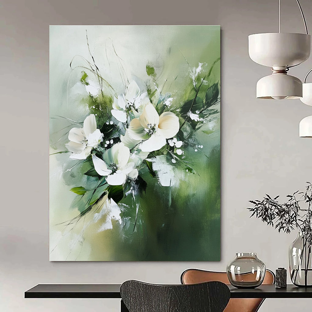 Large abstract painting featuring white flowers and green leaves in neutral tones against a soft green blurry background.STSC365