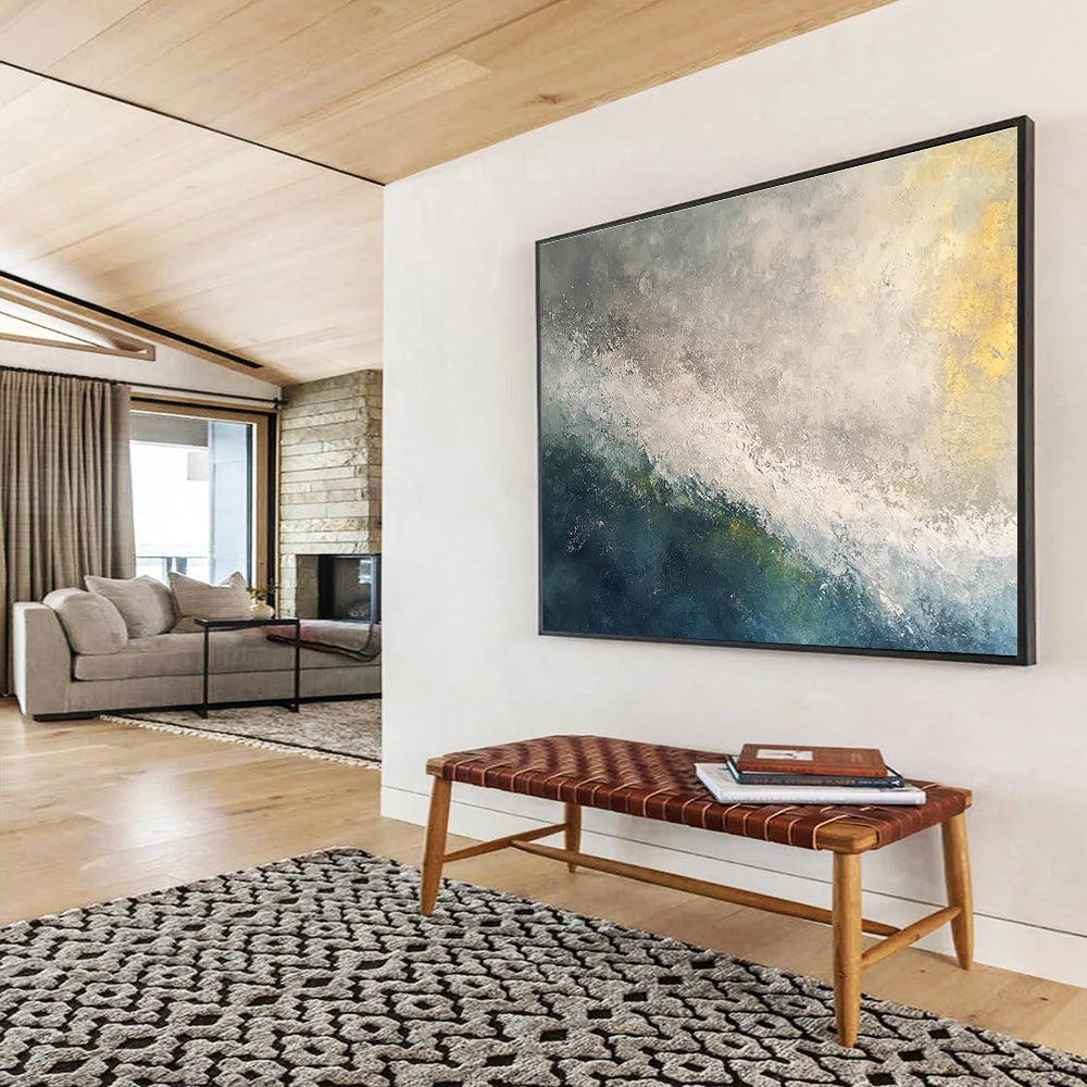 Large abstract oil painting of a stormy ocean at dawn featuring white and grey tones with touches of blue green and yellow.SC119