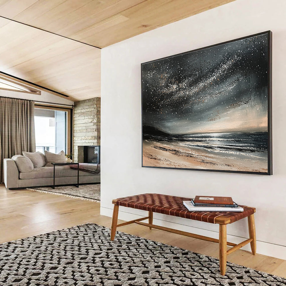 A large abstract painting depicting a calm ocean under a starry night sky with gentle waves and muted gray and black tones.SC528
