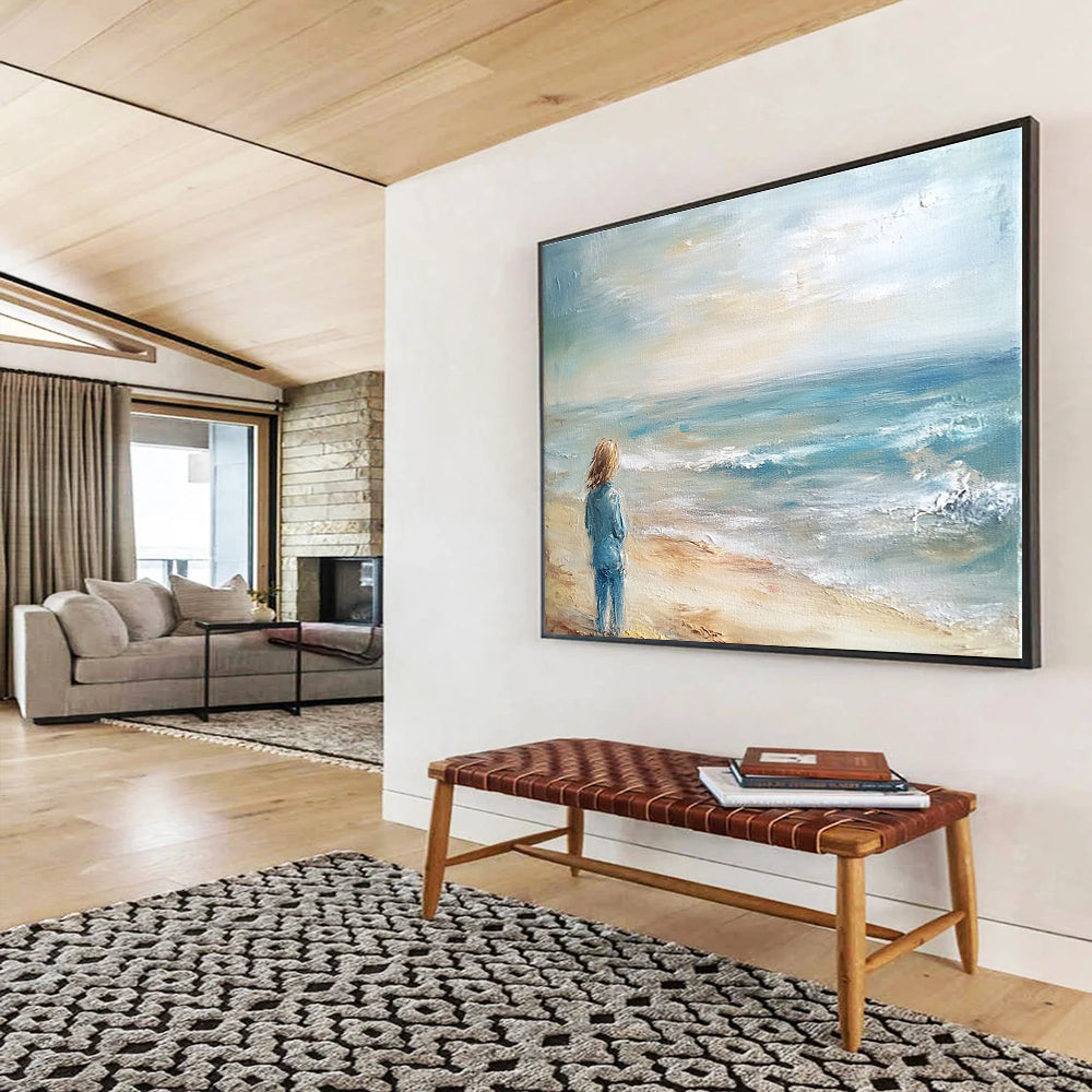 An abstract painting of the ocean and beach in light blue tones and muted colors creates a serene and beautiful atmosphere.SC411