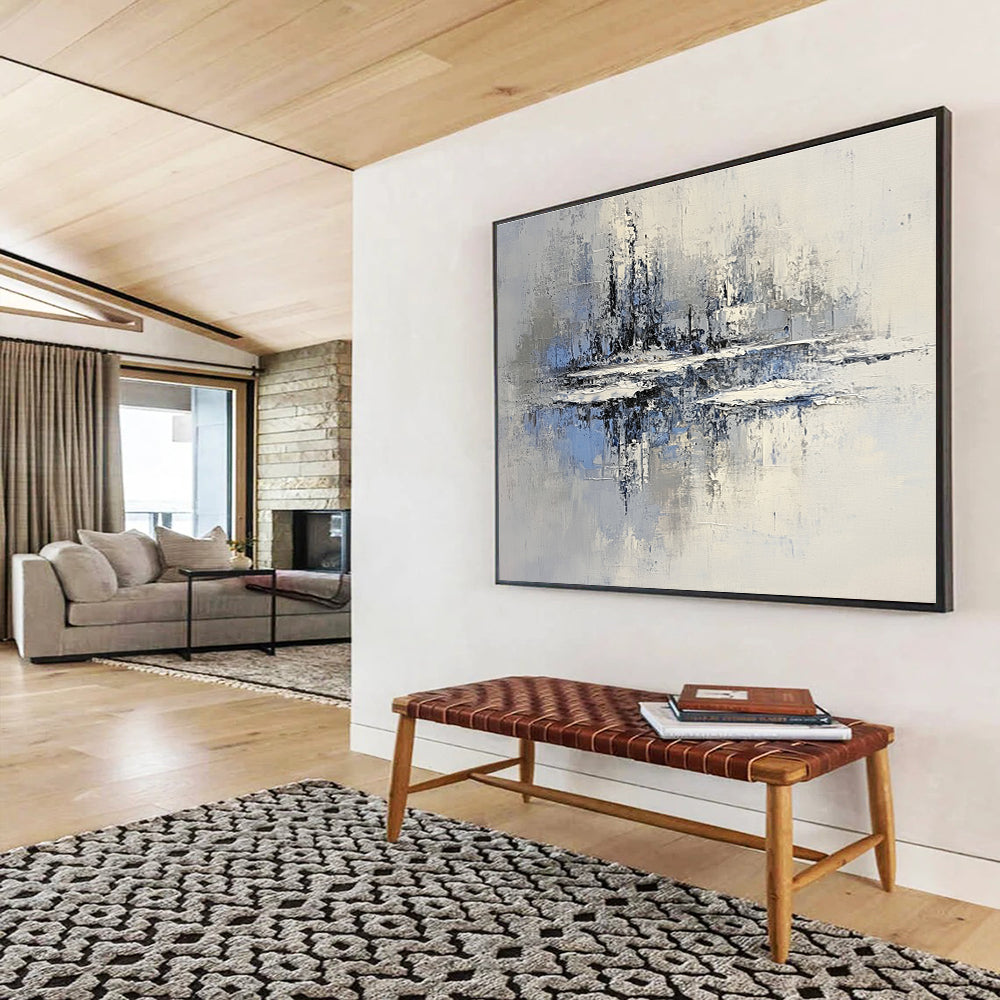 Large abstract painting of an icy lake with floating islands in muted gray and blue tones featuring textured brush strokes and serene winter lighting.SC158