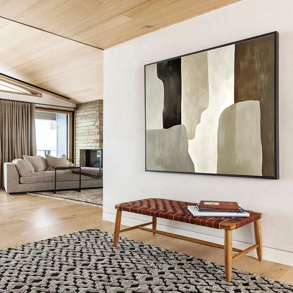 Large abstract painting featuring soft gray and beige tones with loose brush strokes and a prominent black shadow and tall monolithic shape.SC280