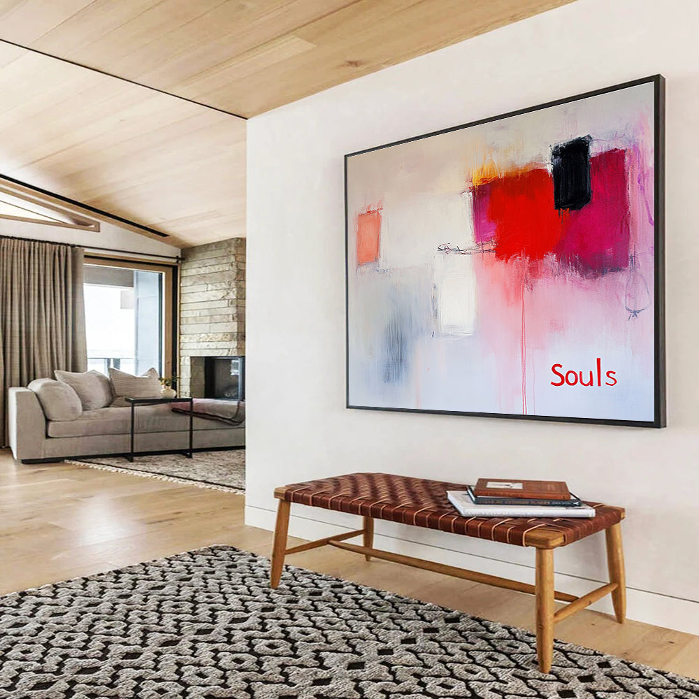 Large abstract painting in soft pinks and whites with red hints features expressive brushstrokes and the word Souls in a minimalist style.SC139