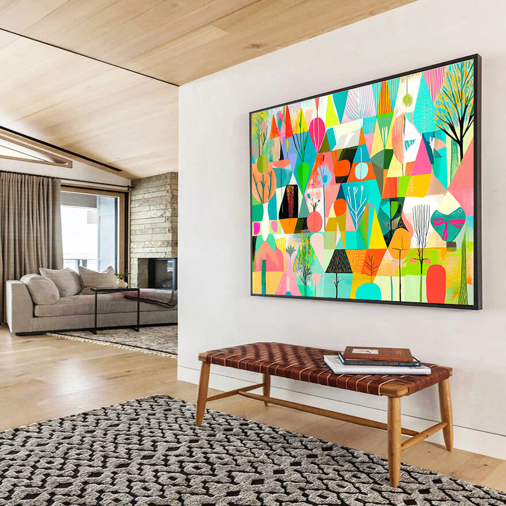 A large abstract painting featuring vibrant geometric shapes in shades of green pink blue yellow and orange with floral elements and nature motifs.SC563
