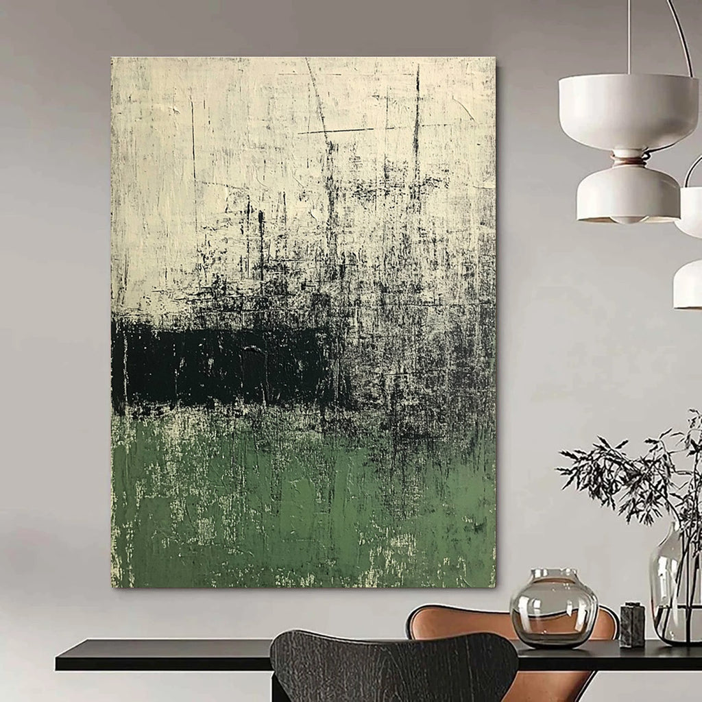 Large abstract painting in green and white tones with dark gray texture on old paper background evokes calmness and mystery through eroded and cracked surfaces.STSC423