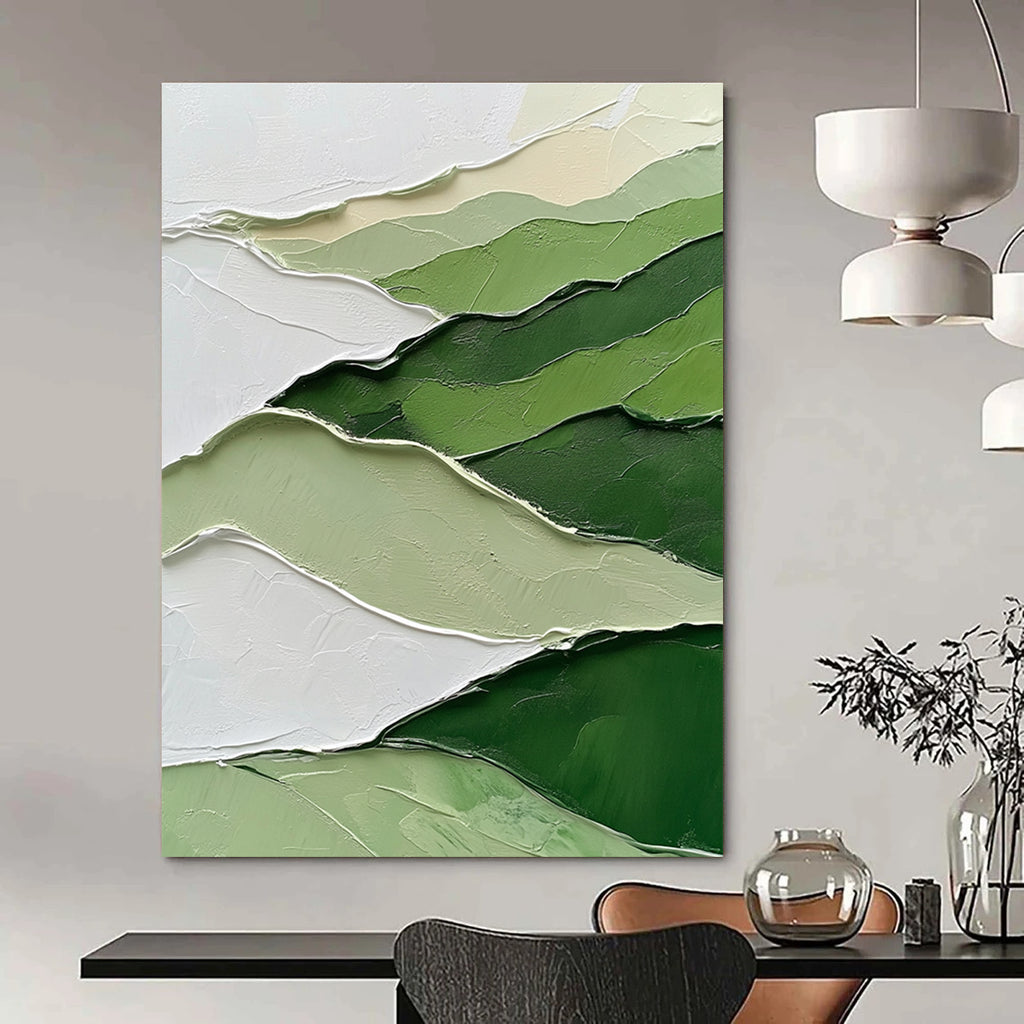 Large abstract painting featuring a green and white mountainous landscape with thick impasto strokes for a textured artistic impact.STSC1005