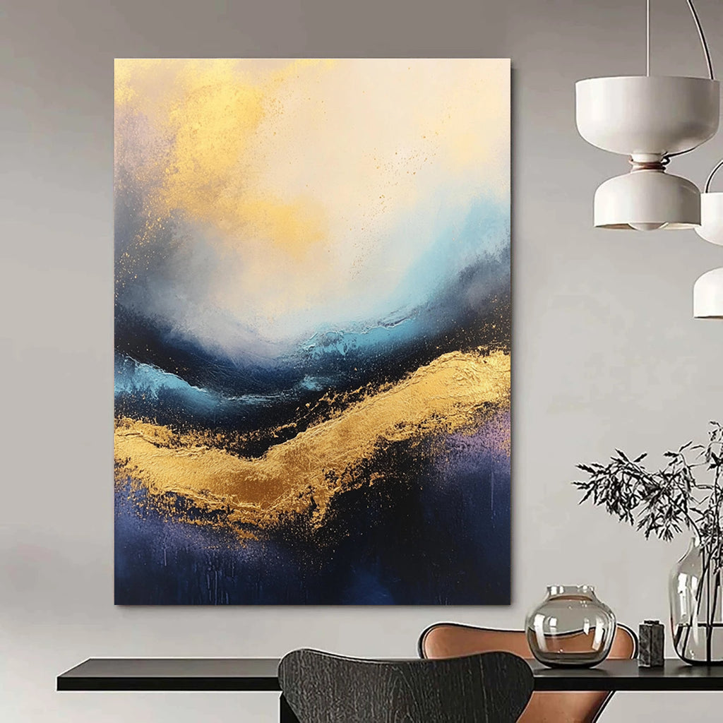 Large abstract painting of stormy seas featuring rich gold and blue tones with a captivating textured surface.STSC333