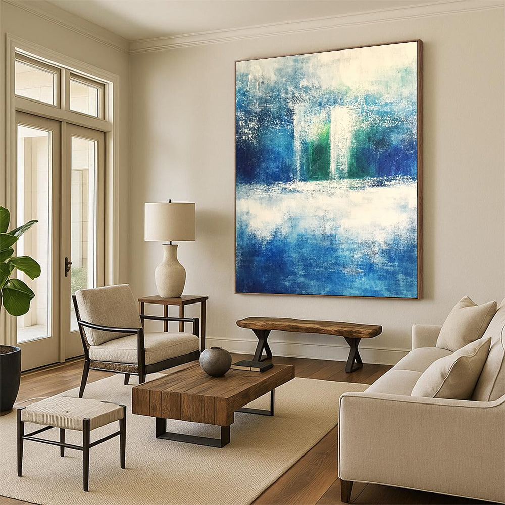 Large abstract painting evoking serene nature with shades of blue green gray and white featuring dynamic brushstrokes of rolling hills and waves.STSC368