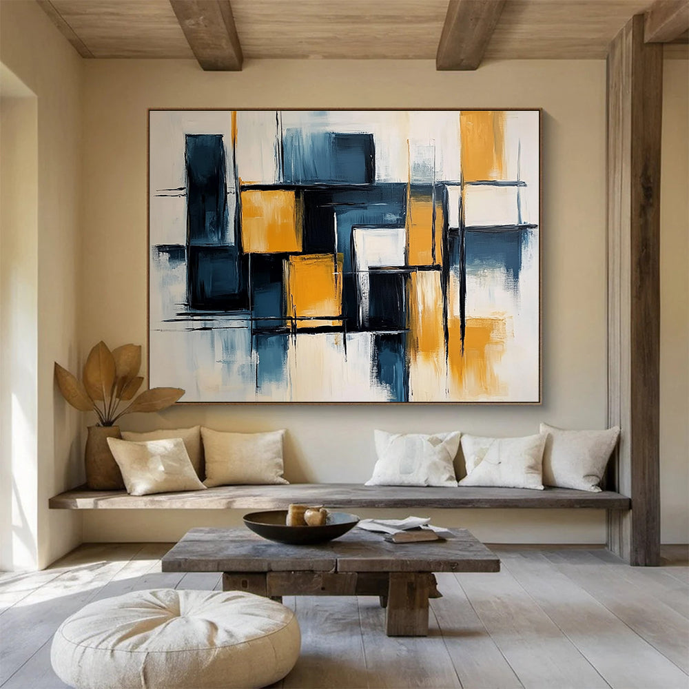 Large abstract painting with light blue and dark yellow color blocks, elegant black lines, geometric shapes, and a touch of orange on a white background.SC591