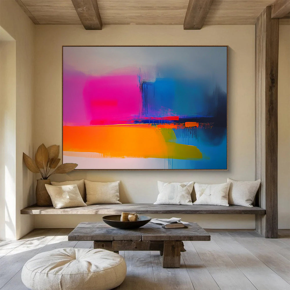 Large abstract painting in neon pink yellow blue orange and green featuring soft gradients smooth brush strokes and a minimalist landscape with blurry edges.SC149