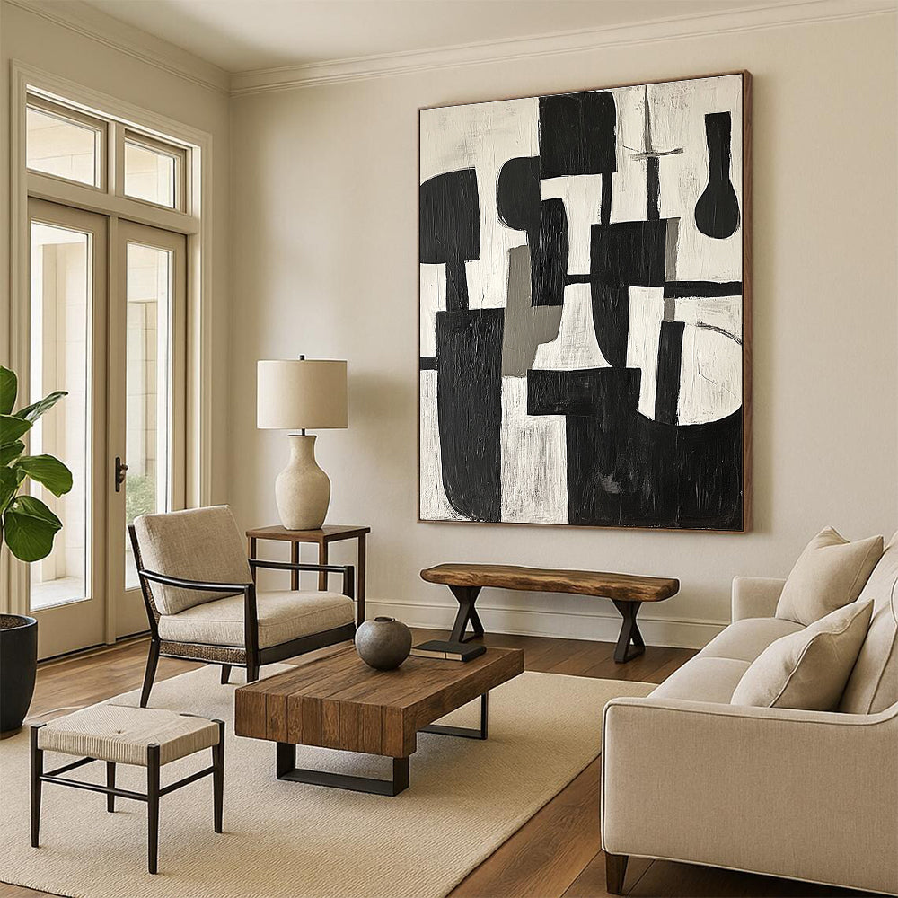Large abstract painting in black and white shapes with gray tones on a white background embodying calmness and modernity inspired by Picasso's cubism.STSC675