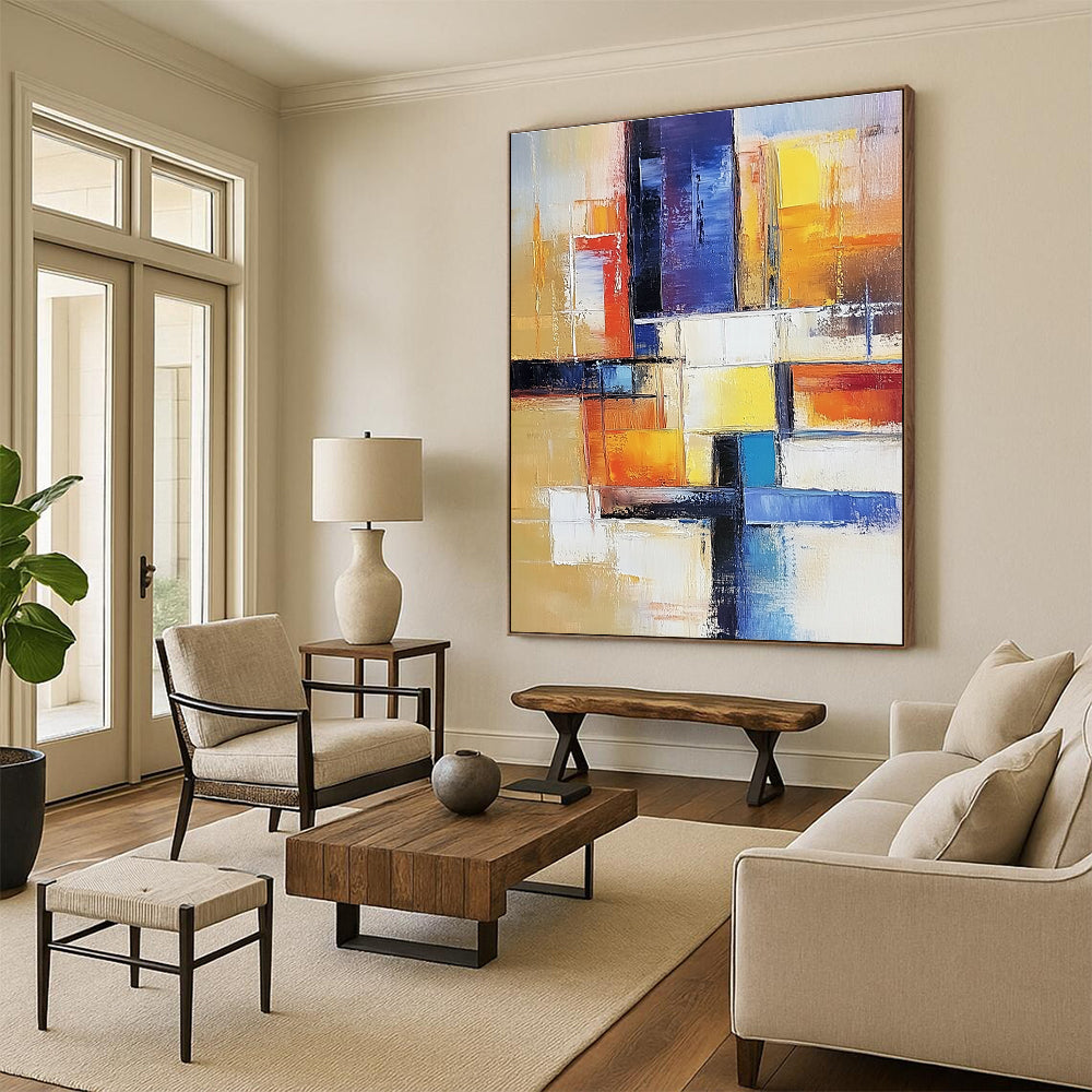 Large abstract painting of an urban landscape in warm colors featuring geometric shapes and soft lines on canvas.STSC153