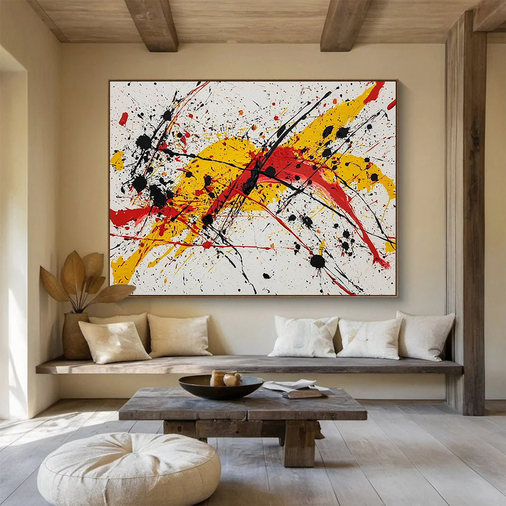 Large abstract painting featuring vibrant red yellow and black splashes evoking energy and freedom through dynamic brushstrokes and harmonious chaos.SC570