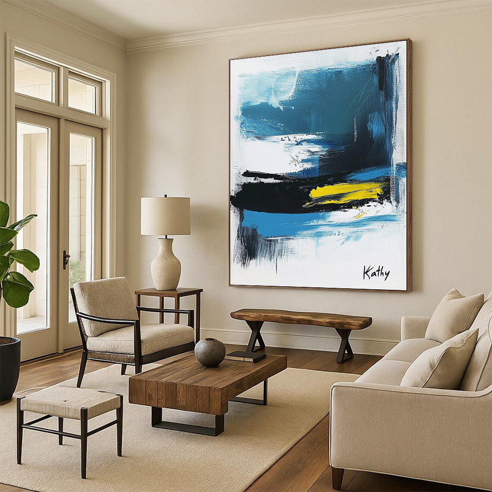 Large abstract painting of the sea featuring blue black and white brush strokes with yellow accents signed by Kathy.STSC1423