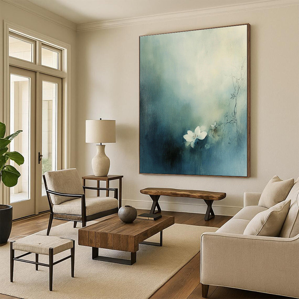 Large abstract painting featuring a small white flower blooming amid muted blue-green tones and hazy fog.STSC631