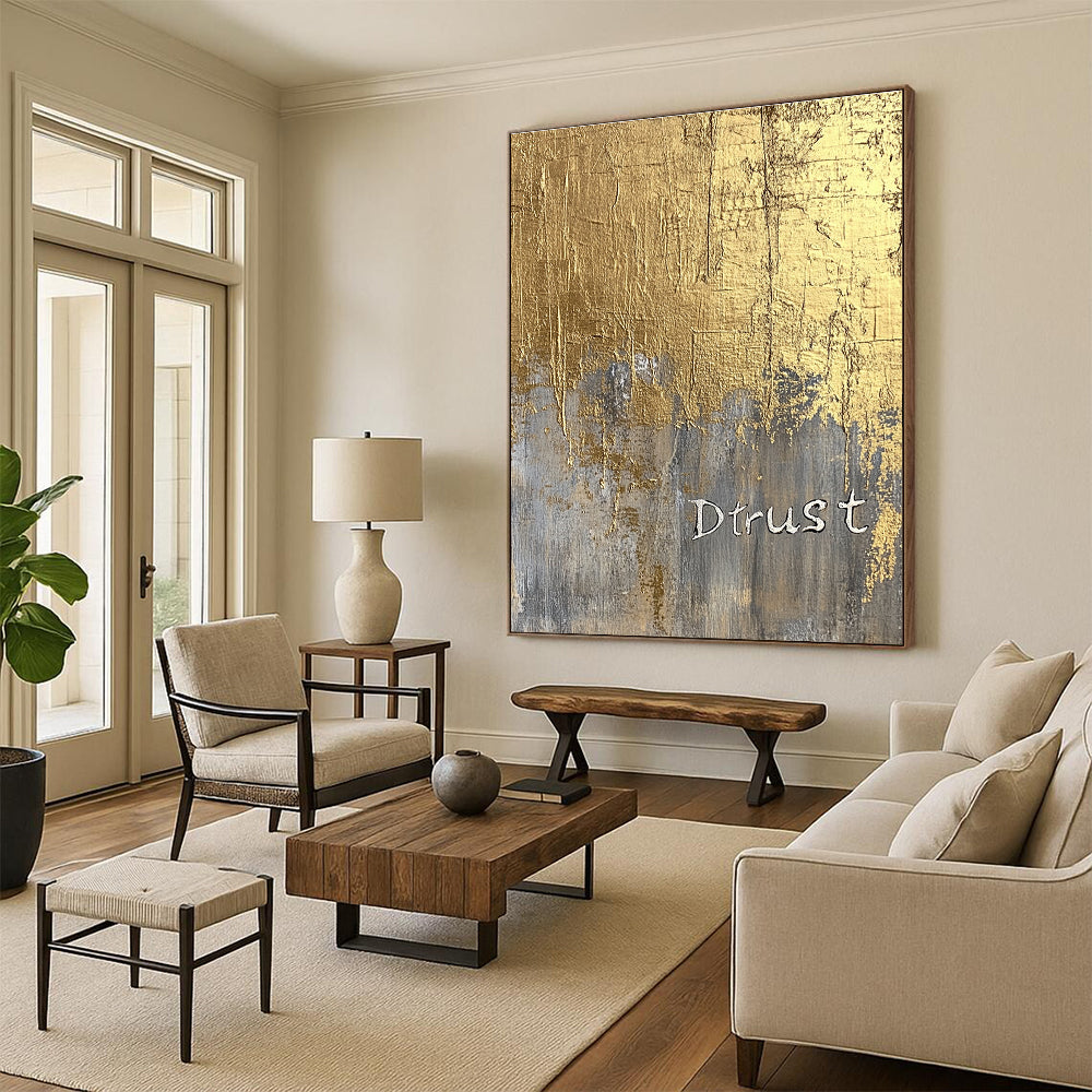A large abstract painting featuring a gold foil background and textured silver lettering of Dtrust with elegant luxury and depth.STSC1003