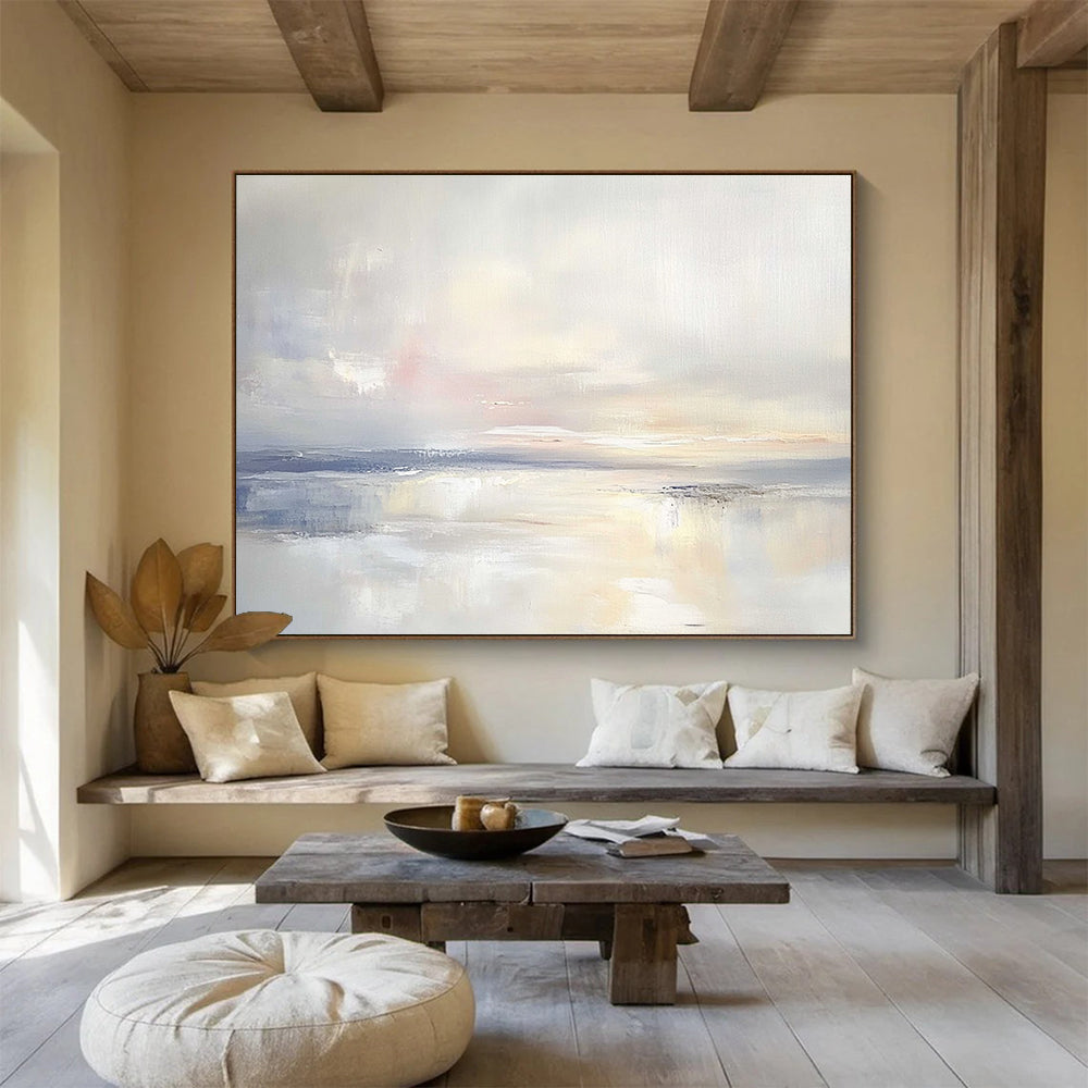 A large abstract painting featuring an open sky and gentle clouds in muted pastels, blending into serene waters for a tranquil ambiance.SC556