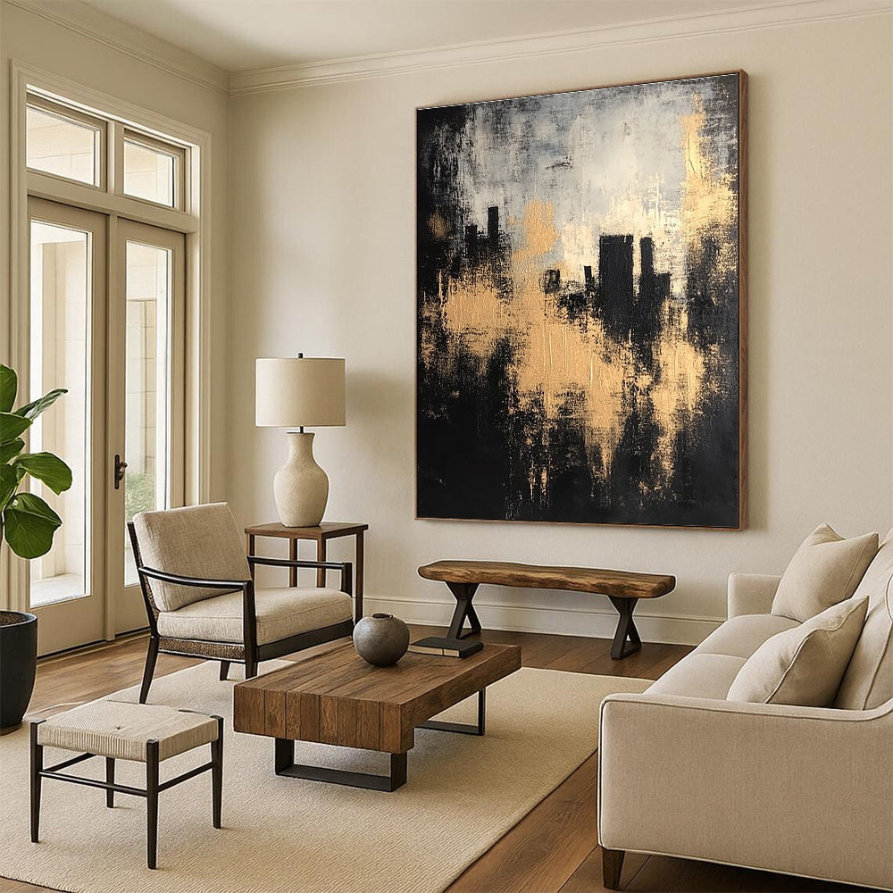 Large abstract painting featuring a black and gray background with golden highlights and silhouettes of buildings in an atmospheric, vintage style.STSC213