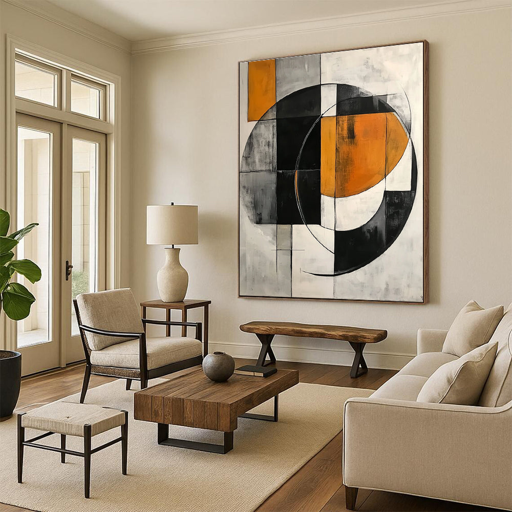 Large abstract painting featuring simple geometric shapes, circles, and half-circles in shades of gray, orange, black, and white.STSC221