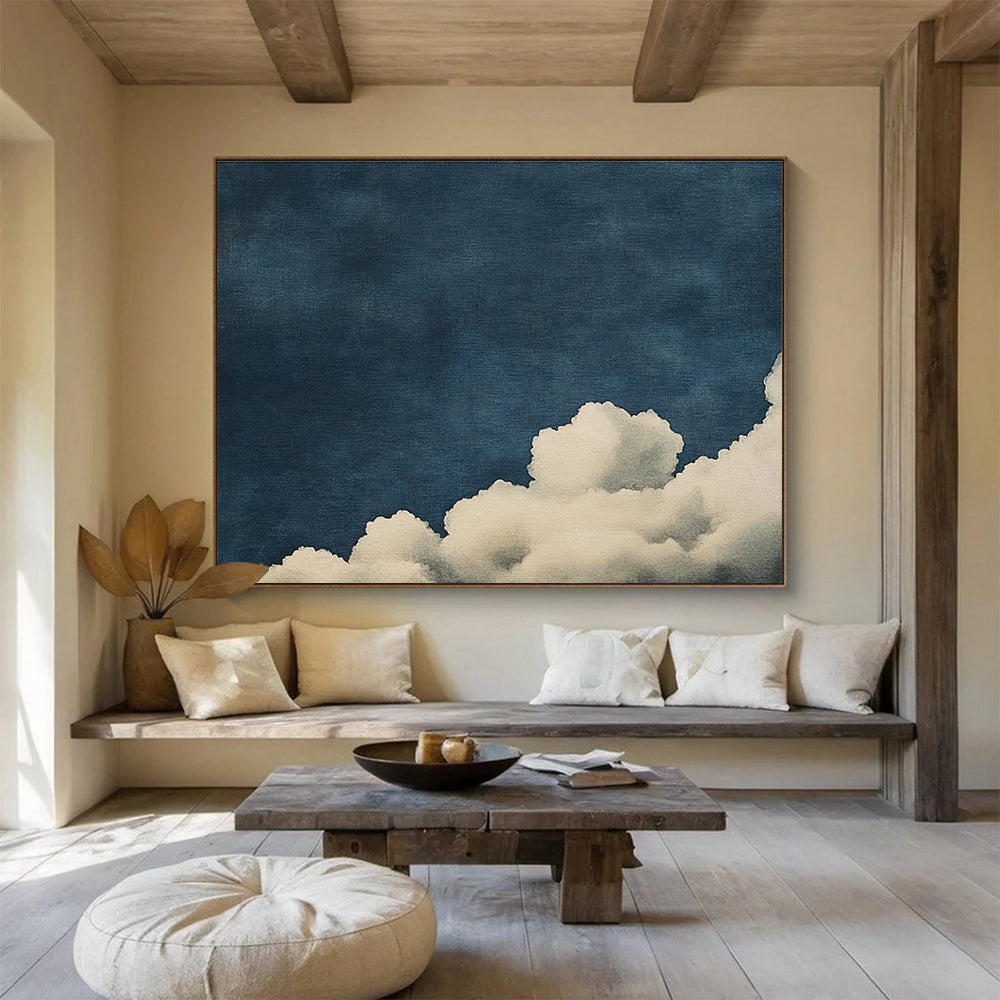Large abstract painting of clouds on textured canvas featuring high contrast white clouds against a minimalist dark blue background.SC523