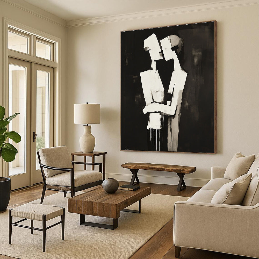 Abstract black and white painting of two figures embracing in a deconstructed minimalist style against a dark background.STSC024